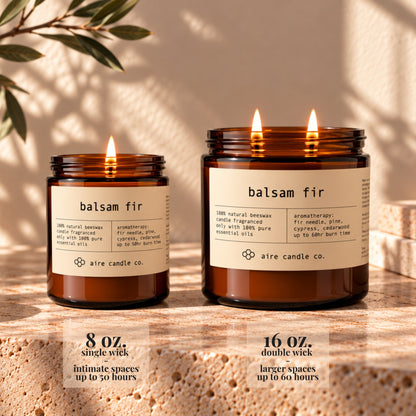 8 oz aire candle displayed next to the 16 oz beeswax candle. The 8 oz has a single wick and is intended for intimate spaces. It burns up to 50 hours. The 16 oz candle has two wicks and is intended for larger spaces. It burns up to 60 hours.