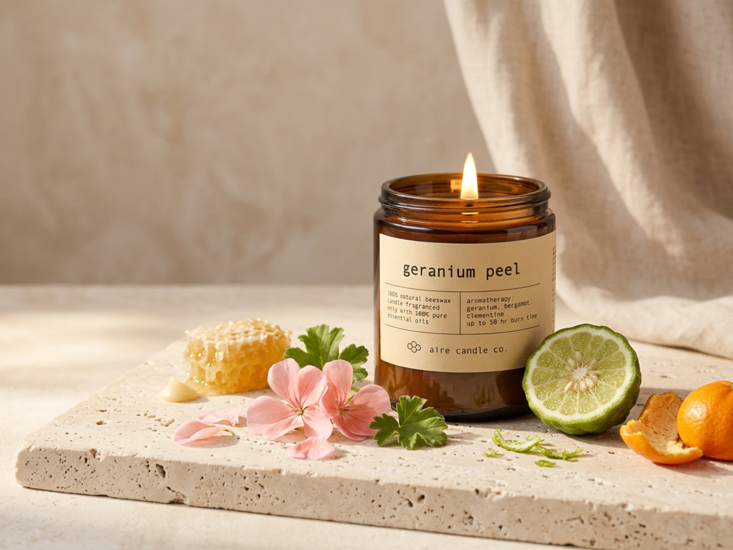 Geranium Peel beeswax candle by Aire Candle Co. featuring scent notes of geranium, bergamot and clementine. 