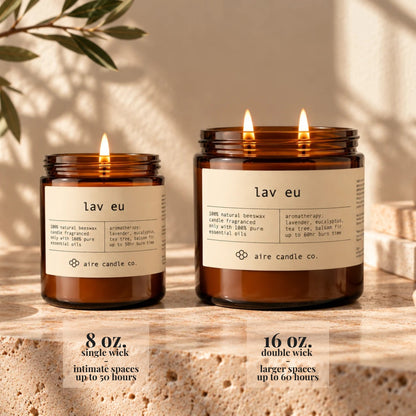 8 oz aire candle displayed next to the 16 oz beeswax candle. The 8 oz has a single wick and is intended for intimate spaces. It burns up to 50 hours. The 16 oz candle has two wicks and is intended for larger spaces. It burns up to 60 hours.