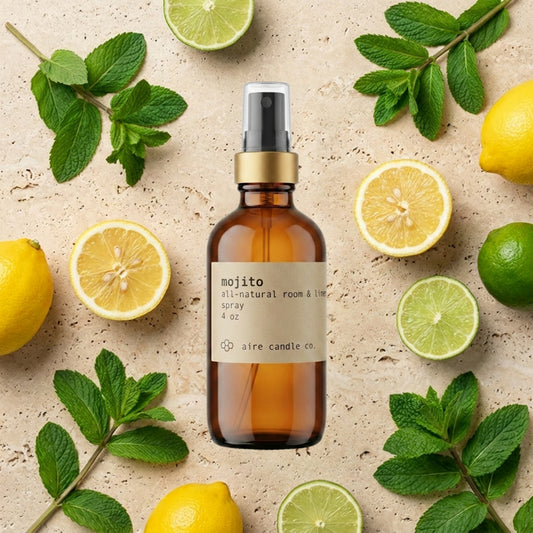 Aire Candle Co. Mojito Essential Oil Scented Room Spray Surrounded by Scent Notes of Lime, Lemon and Spearmint Essential Oils.
