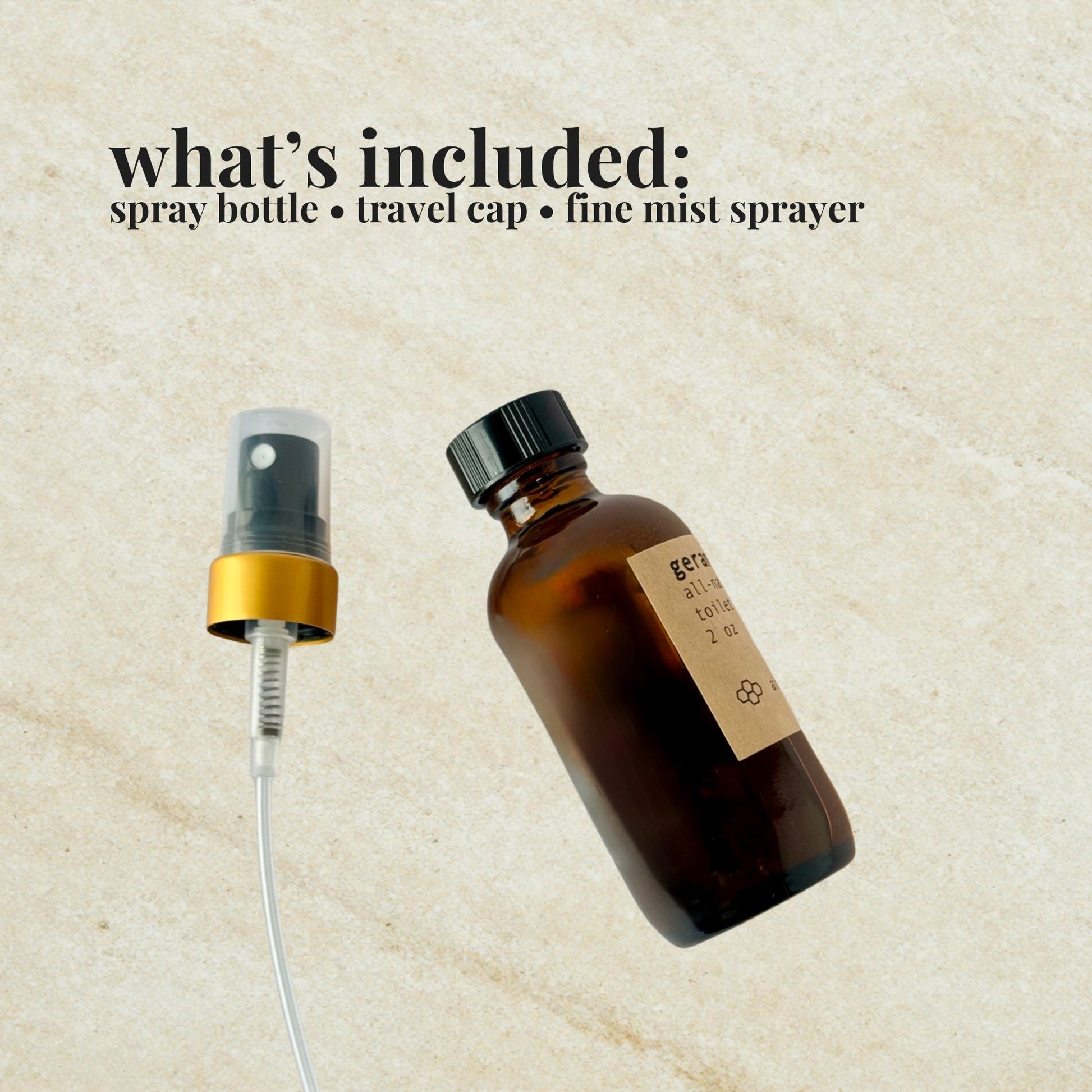 Aire Candle Co. Spruce & Pine Toilet Bowl Spray laying flat on a canvas background showing what’s included — a 2 oz amber glass bottle, travel cap and fine mist sprayer with a gold rim.