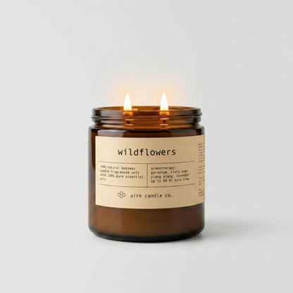 Wildflowers Beeswax candle by aire candle co. featured in the 16 oz size with two wicks.