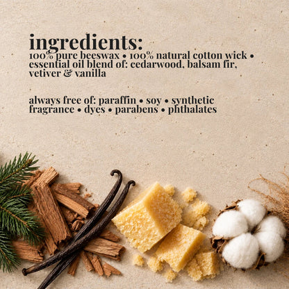 Ingredients list for aire candle co.'s mahogany driftwood essential oil scented beeswax candle with natural materials on a textured background