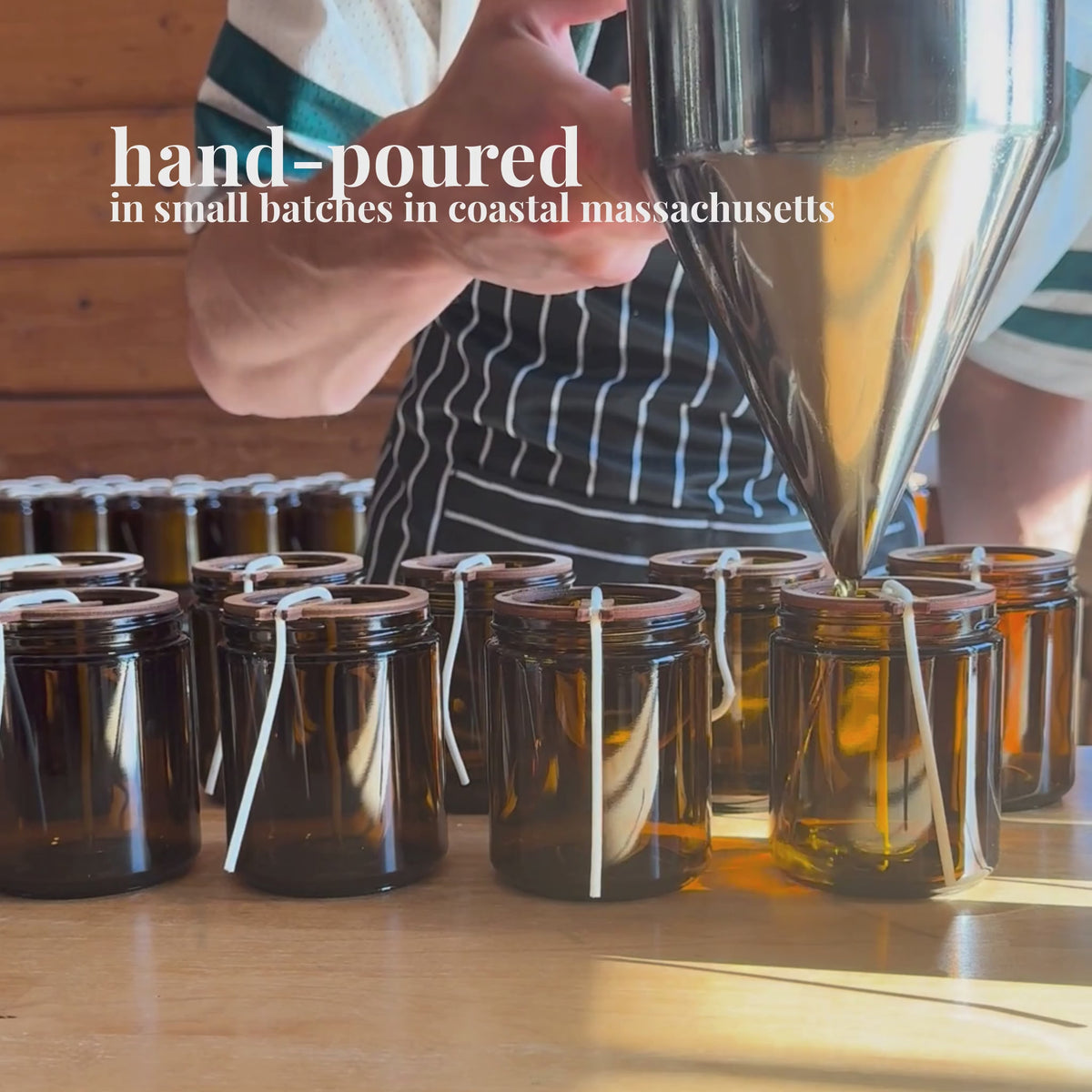 Video showing owner of Aire Candle Co. hand-pouring individual beeswax candles in their studio in costal Massachusetts.