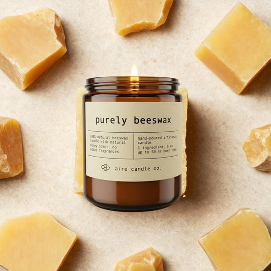 Purely beeswax candle with beeswax blocks on a beige background