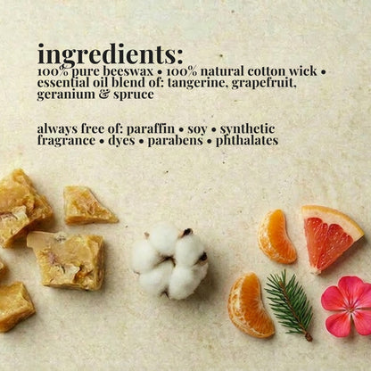 Ingredients list for aire candle co.'s sweet tang essential oil scented beeswax candle with natural materials on a textured background